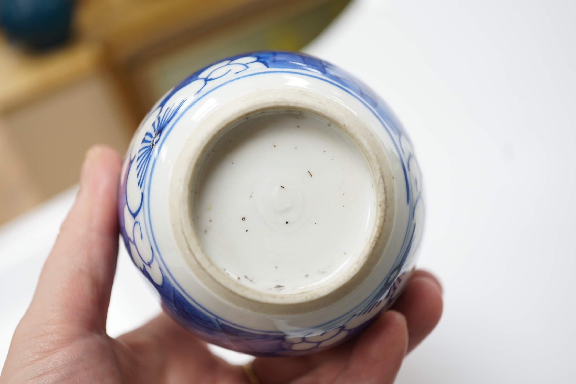 A Chinese Kangxi blue and white ‘prunus’ ovoid jar, 11cm